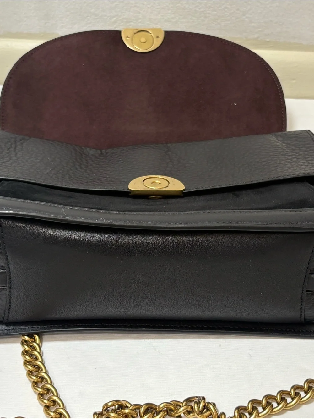 Coach sleek black